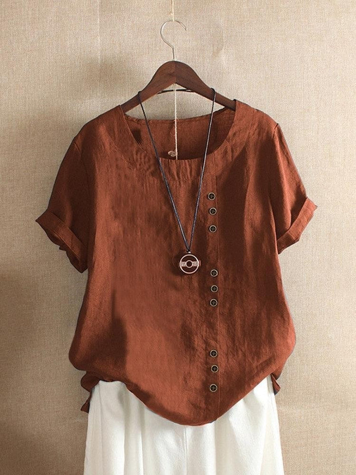 Elegant feminin topp för damer i lätt och luftigt material, perfekt som sommarkläder