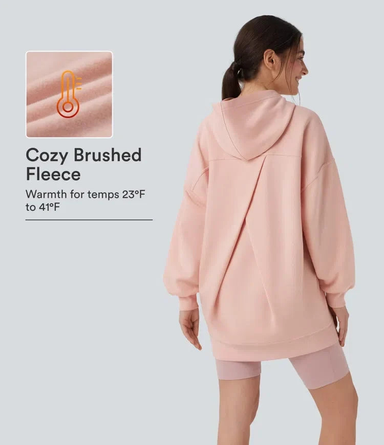 Rosa oversized huvtröja bakifrån med huva
