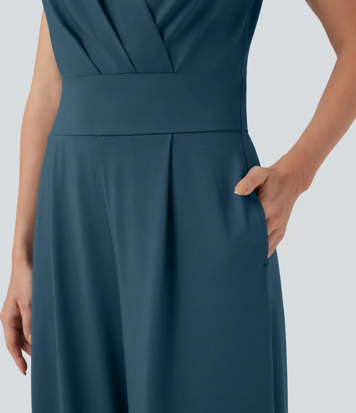 Stilren damjumpsuit i blått med moderiktig design och fickor