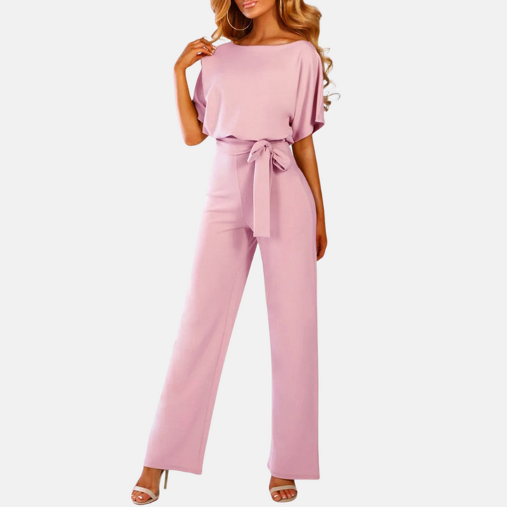 Rosa stilren sommarjumpsuit med knytband i midjan