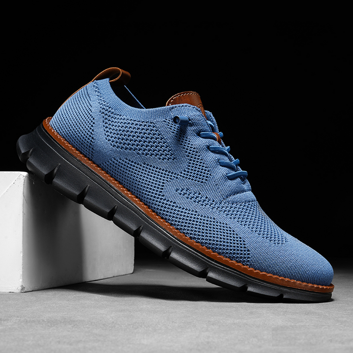 Stilrena herrsneakers i profil som visar den moderna formen