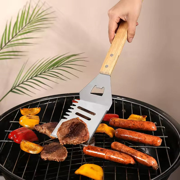 5-i-1 köksverktyg och grillspade med gaffel, brett blad, halkfritt mjukt handtag. Mångsidig och värmetålig design.