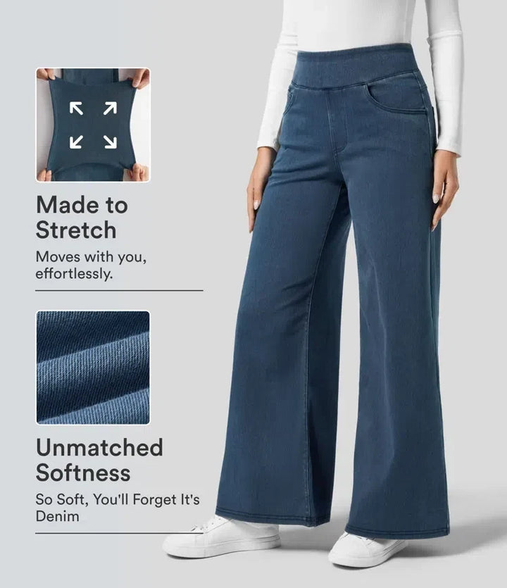 Demonstration av extrem stretch och mjuk tygstruktur på damjeans