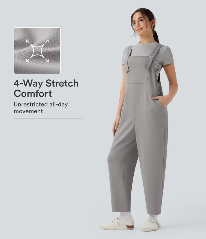 Moderna harem overall för dam med stretch och funktionella detaljer