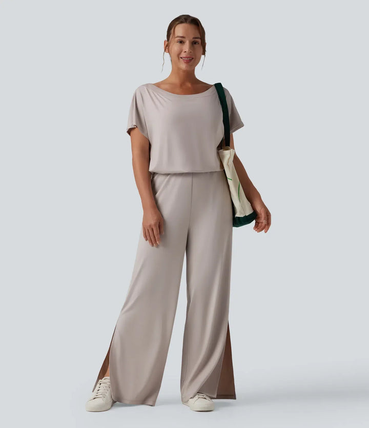 Närbild på praktiska fickor och snygg skärning på damjumpsuit