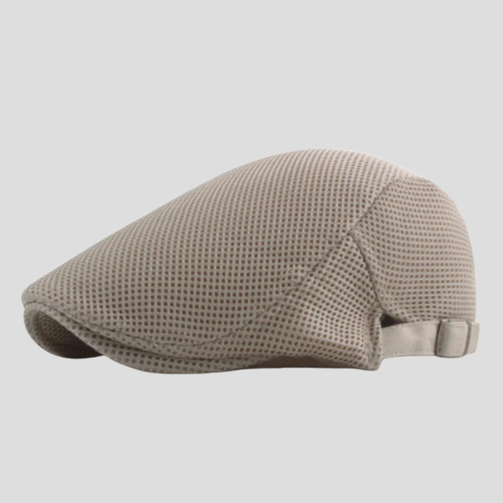 Närbild på nätkepsens luftiga tyg och sömmar för optimal ventilation