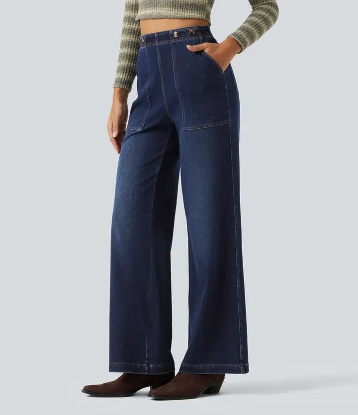 Sidovy av damkläder mörka högmidjade vida jeans med fickor