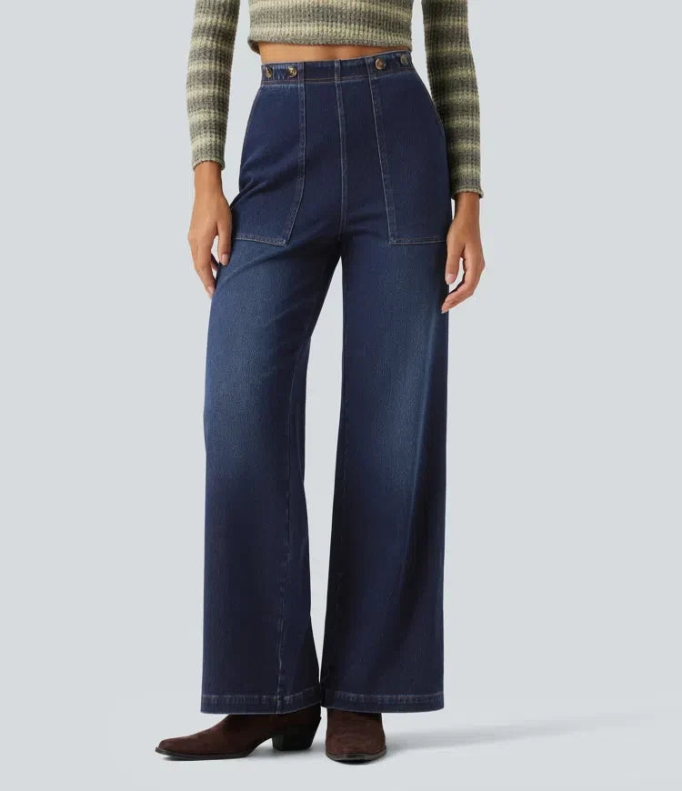 Damkläder mörka högmidjade vida jeans med fickor framifrån