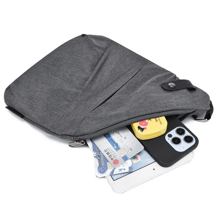 Ergonomisk crossbody axelväska i grå färg för vardag och resa