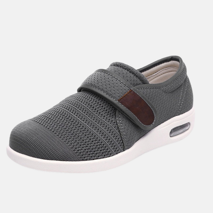 Grå herrsneakers med ortopediskt fotstöd och dämpad sula för promenader