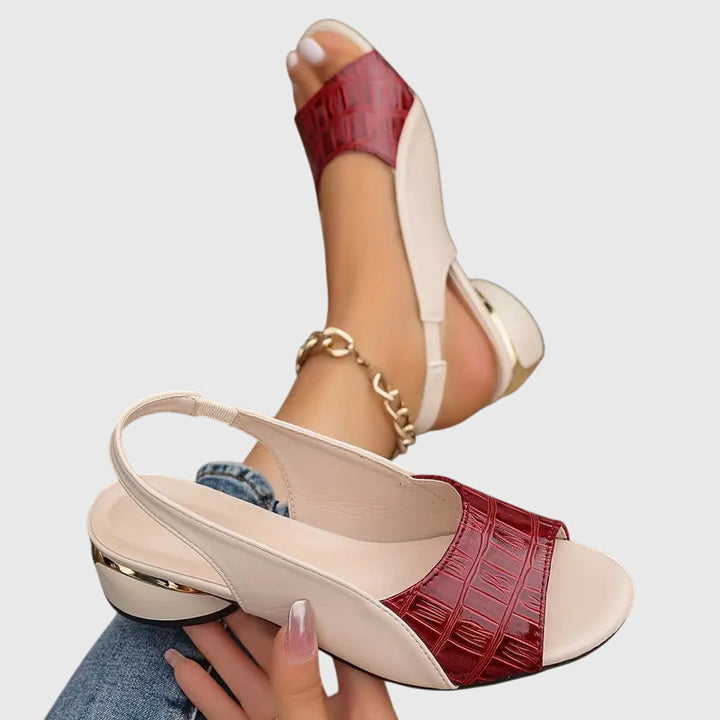 Närbild på dam sandaler Whitney med remdesign och klack