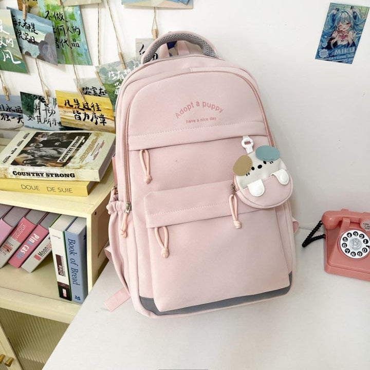Rosa lätt högkapacitets pendlarryggsäck med söt accessoar