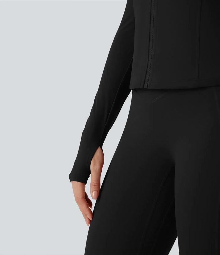 Fitnesskläder för dam: grå yogajacka med tumhål och dragkedja