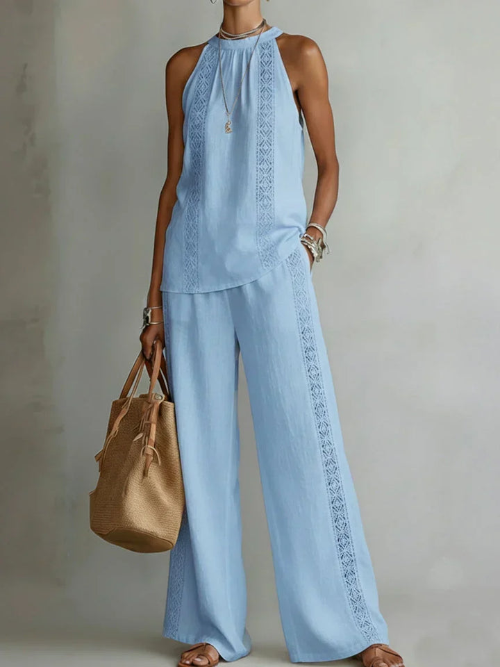 Vitt elegant damset med axelband, perfekt som sommarset och vardagsmode