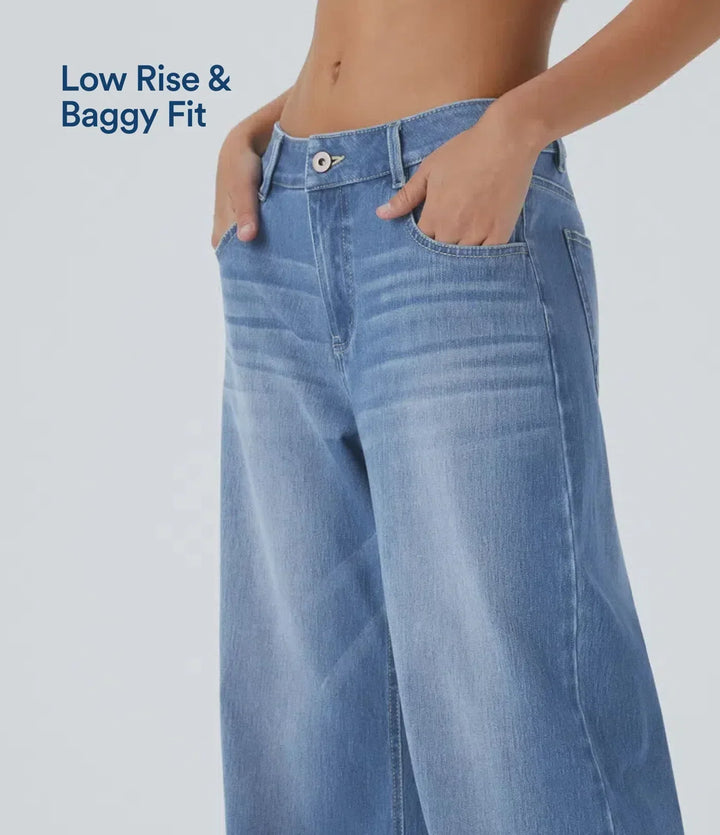 Detaljbild på fickor och sömmar på damjeans med låg midja och stretch
