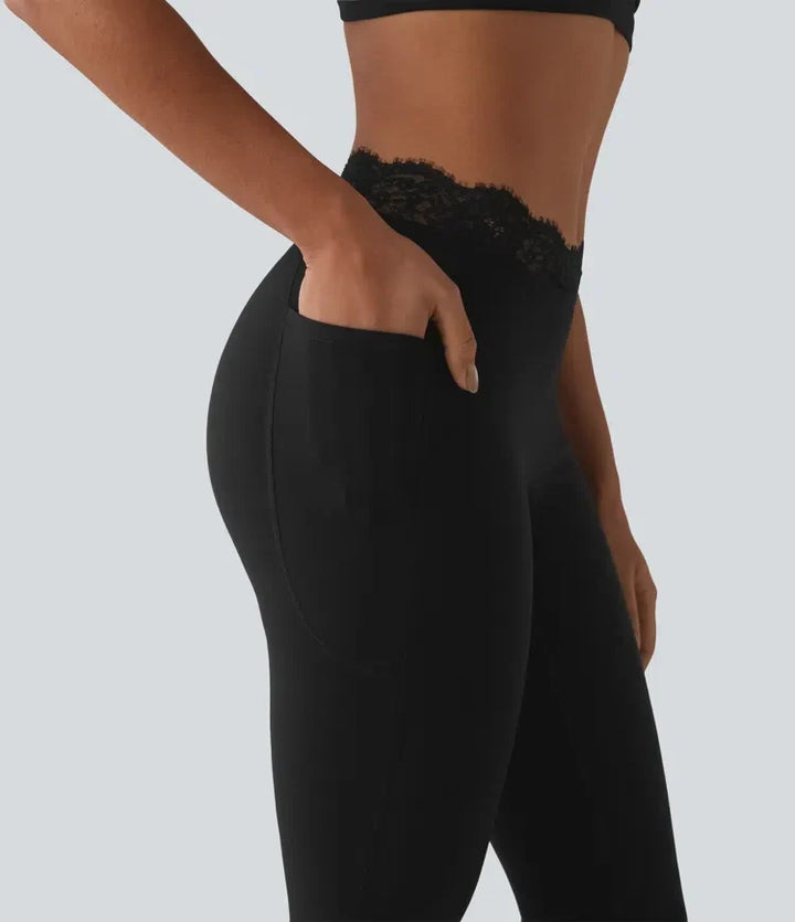 Svart utsvängd damtisha för träning med stretch och hög midja