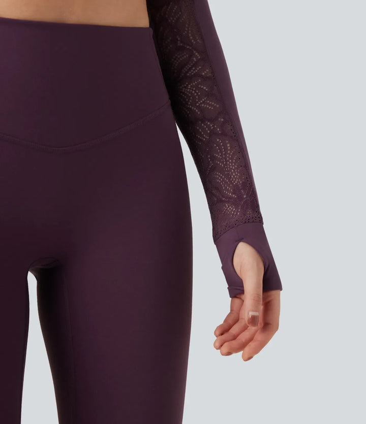 Närbild på exklusiv spets på damjacka för träning och yoga