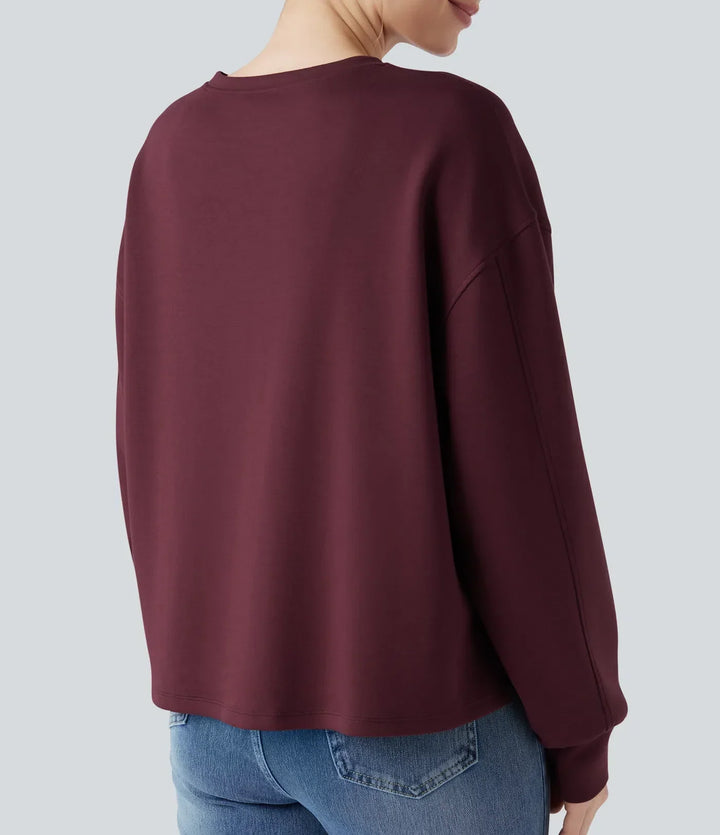 Beige dam sweatshirt med rund hals och långa ärmar i mjuk bomull