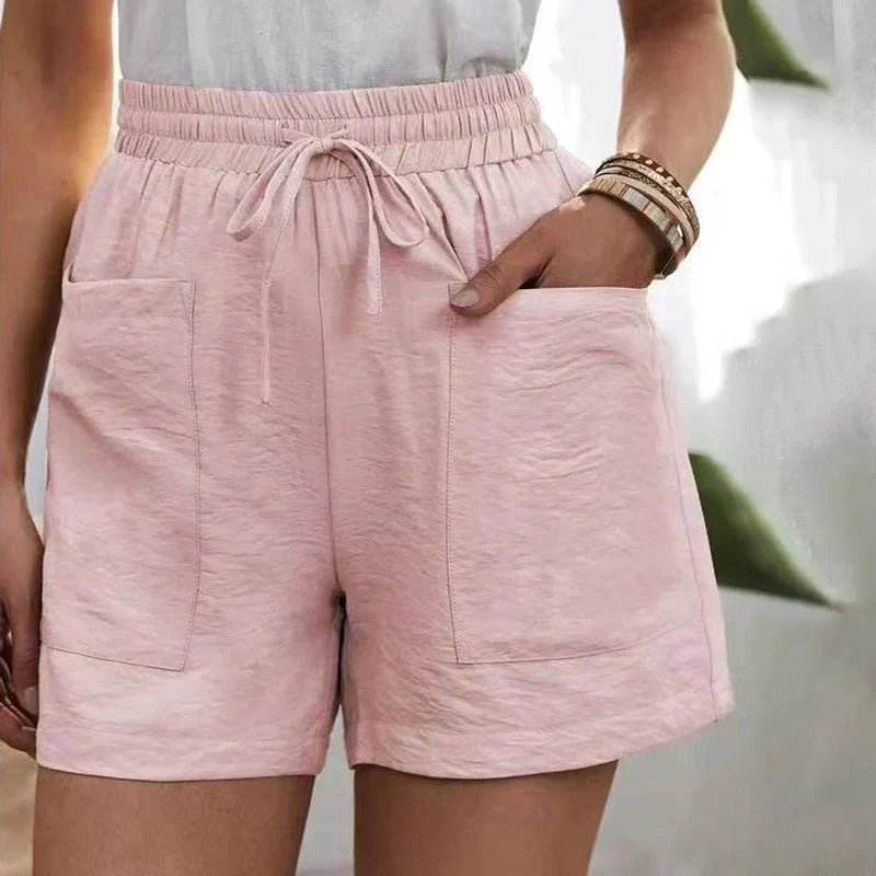 Ljusrosa damshorts med dragsko och ledig passform