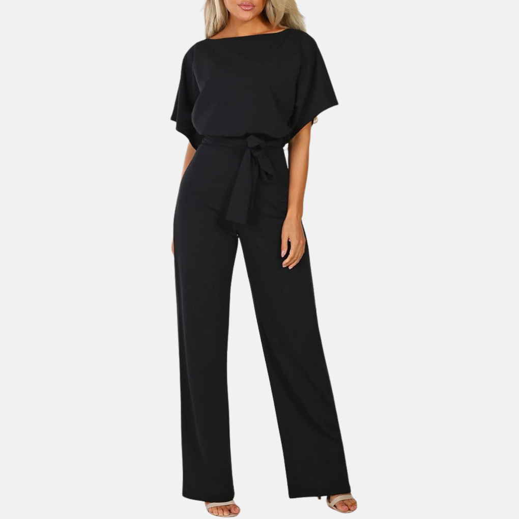 Närbild på tyget och sömmarna i den eleganta sommarjumpsuiten för dam