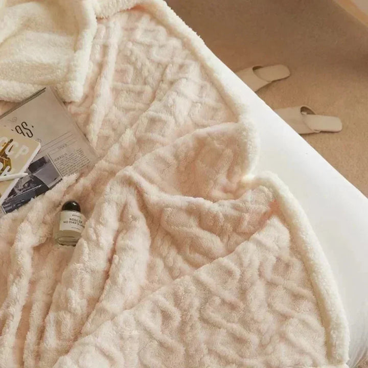 Närbild på den varma hemtextilen och dess fluffiga struktur