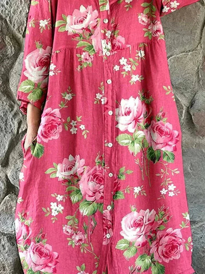 Damklänning Rosalie med blommönster och knäppning fram