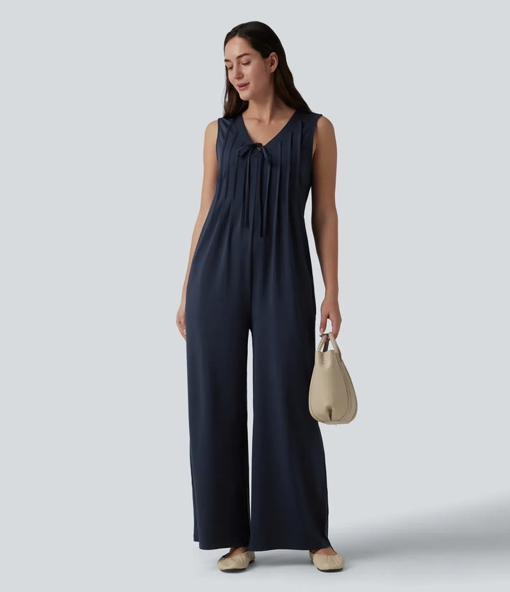 Moderna kläder för dam: bekväm vardagsjumpsuit med fickor och V-ring