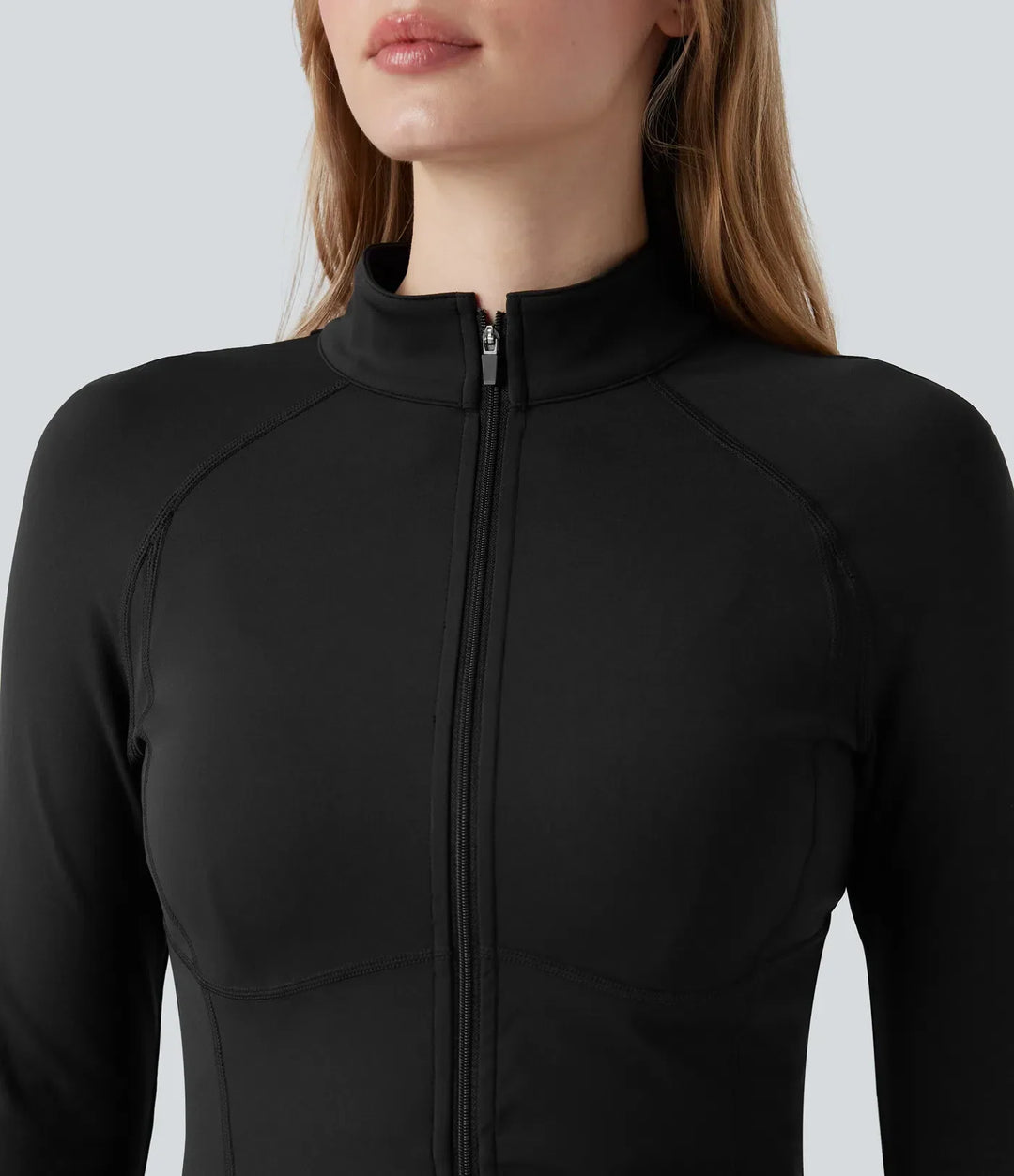 Helhetsbild på croppad 3-i-1 vinterjacka med vaddering och tumhål