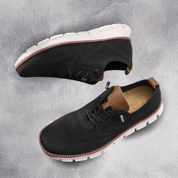 Detaljbild på ventilerande tyg på herrsneakers i modern stil