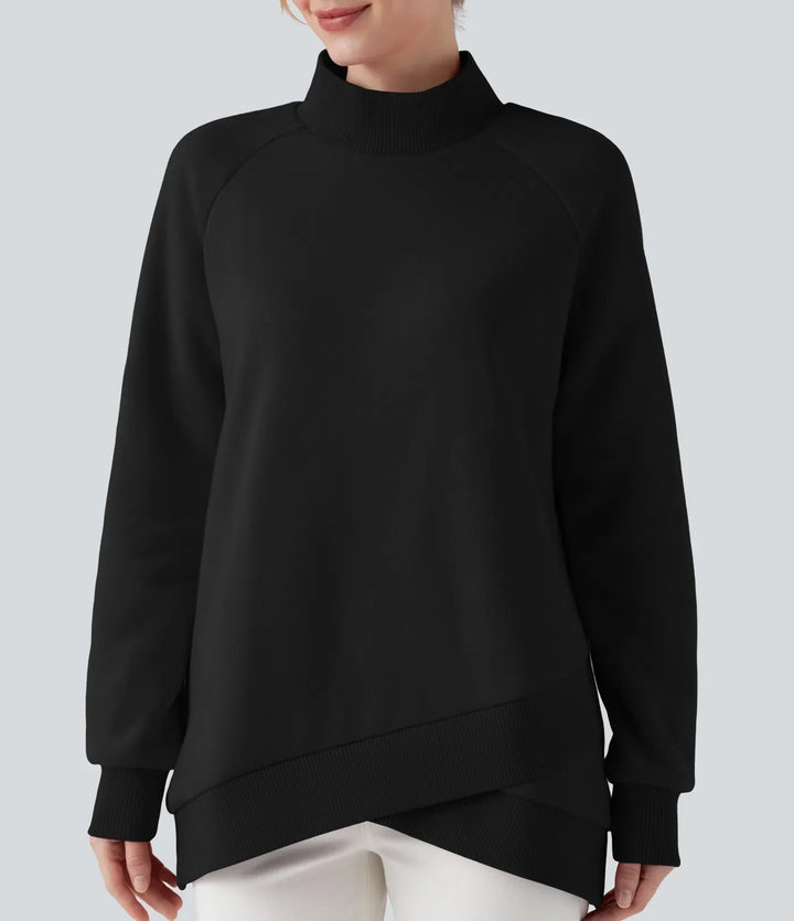 Svart långärmad sweatshirt för dam med halvpolo och stilren omlottfåll