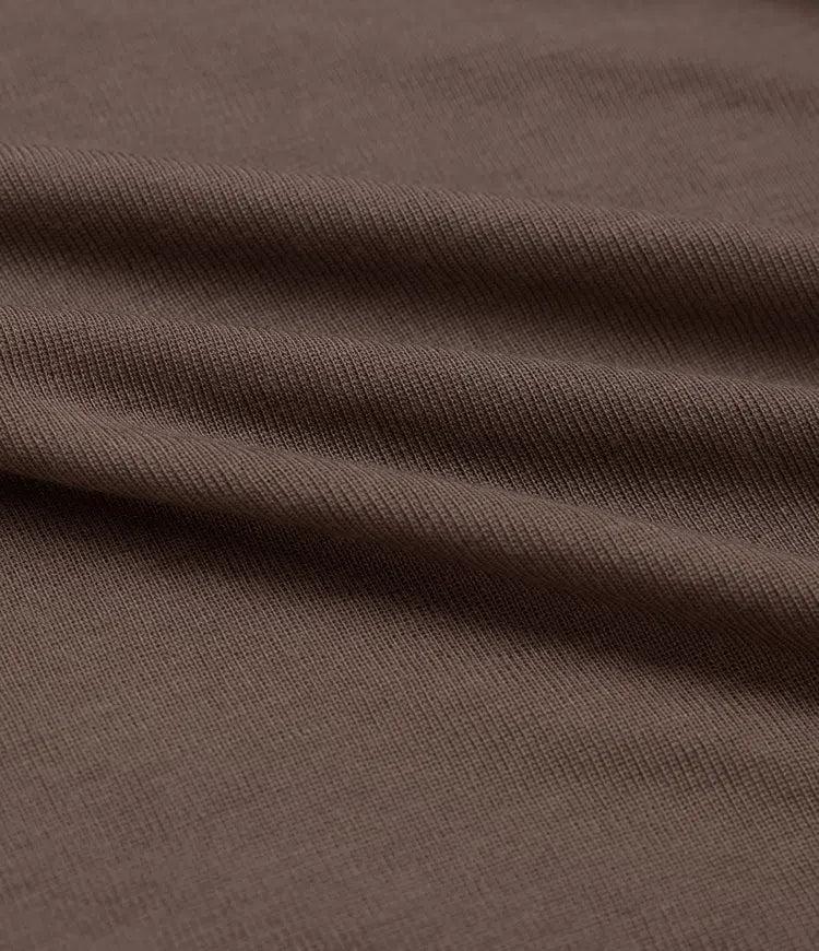 Svart långärmad t-shirt för dam i asymmetrisk vardagsstil