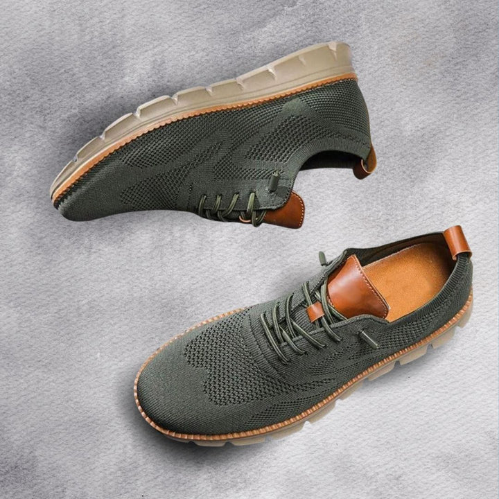 Ventilerande herrsneakers från sidan med dämpad sula