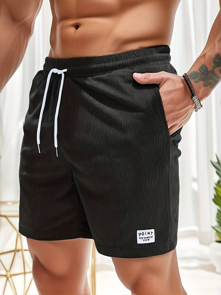 Snygga svarta Eli herrshorts med randigt mönster och dragsko