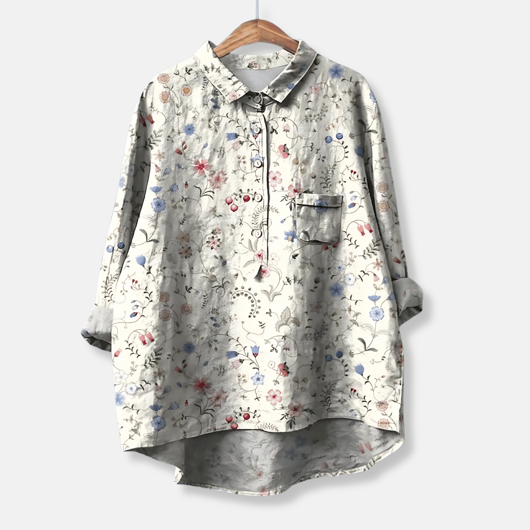 Dam blus med blommigt mönster och lång ärm i lös passform