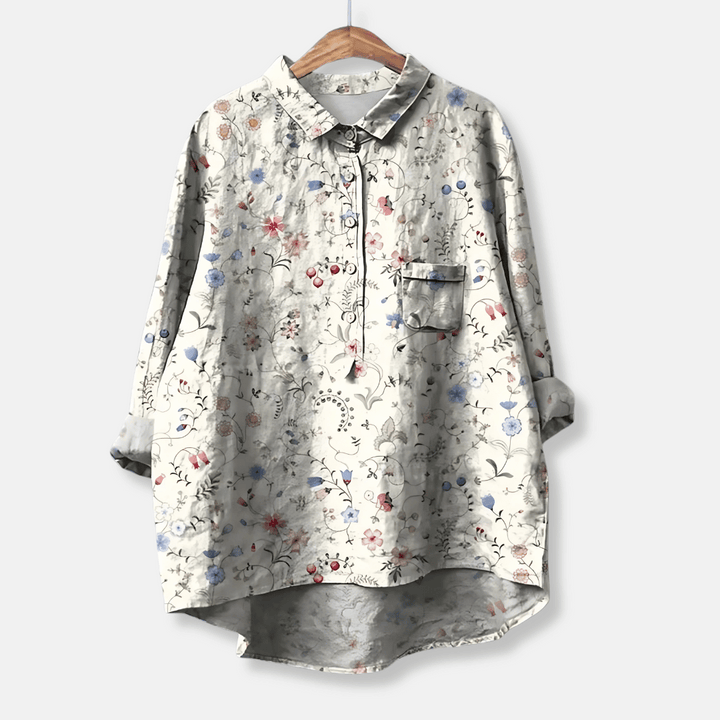 Dam blus med blommigt mönster och lång ärm i lös passform