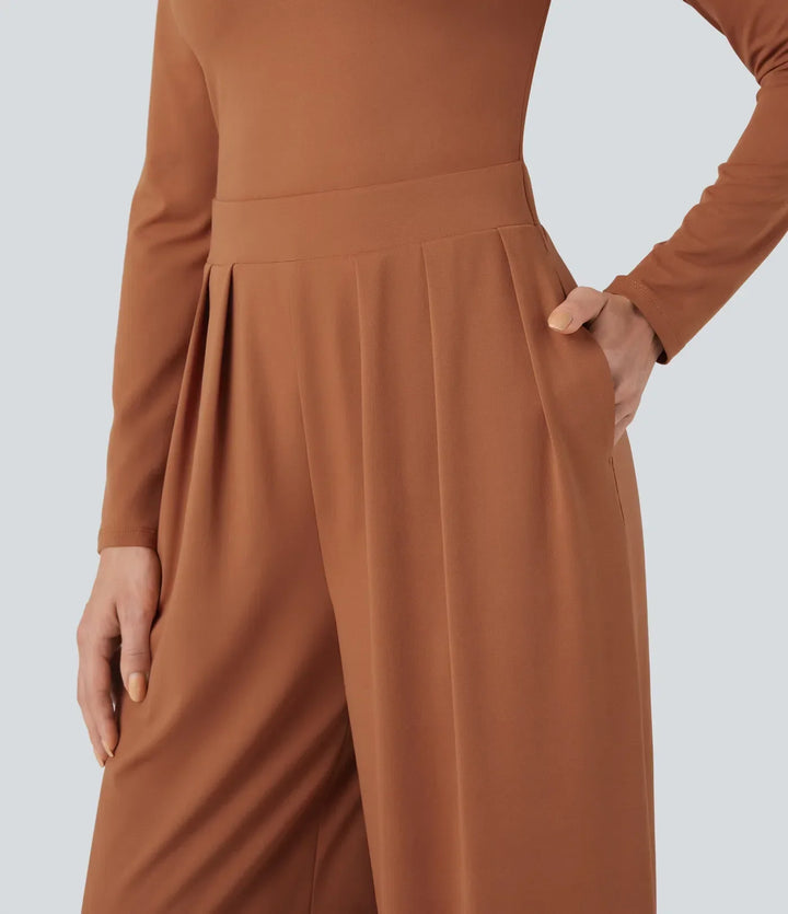 Stilren långärmad jumpsuit för dam med vida ben i helfigur