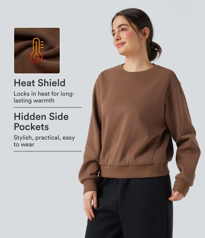 Vardaglig damtopp i sweatshirtmodell med långa ärmar bakifrån