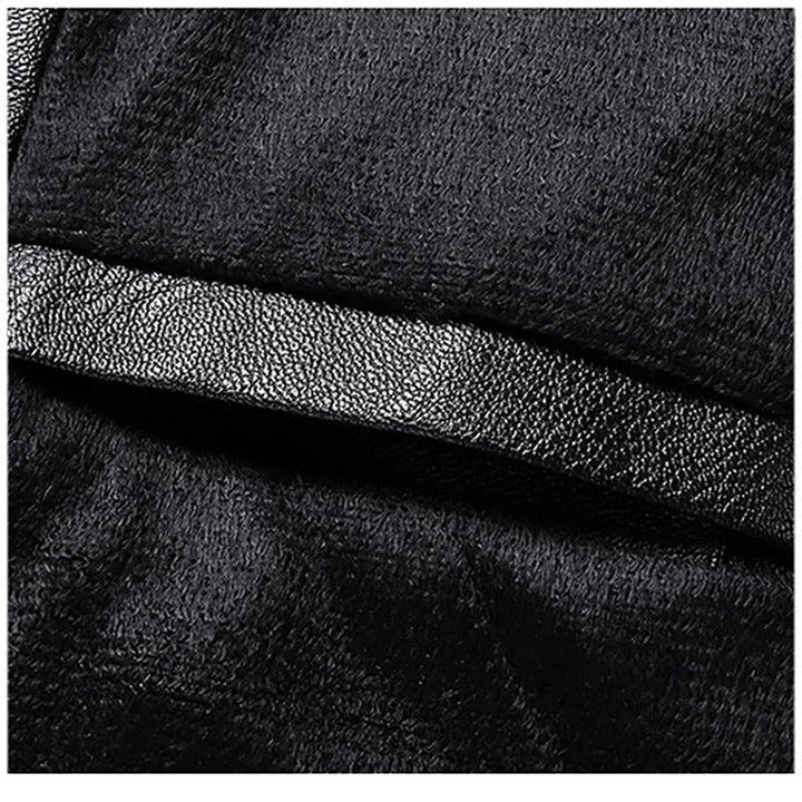 Närbild på textur och sömmatdetaljer på herrmode jacka