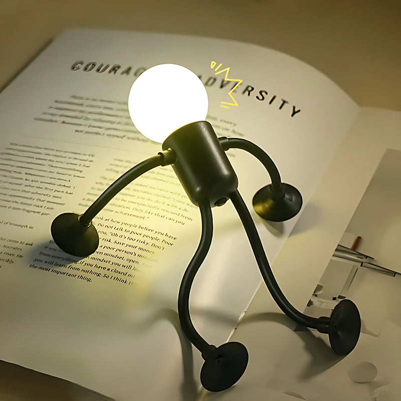 Rosa dekorativ LED-lampa med sugpropp placerad på slät yta