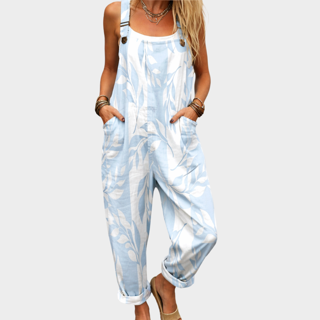 Damkläder mönstrad blå och vit jumpsuit med hängslen och fickor