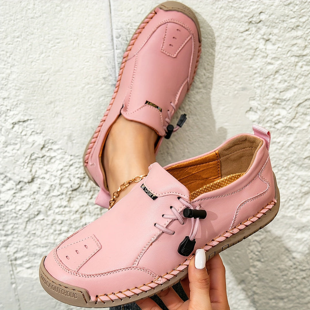 Hälparti på eleganta damloafers med bra passform