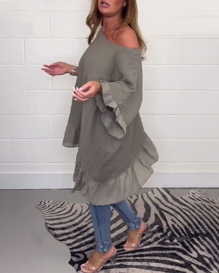 Enfärgad casual topp med volangärm
