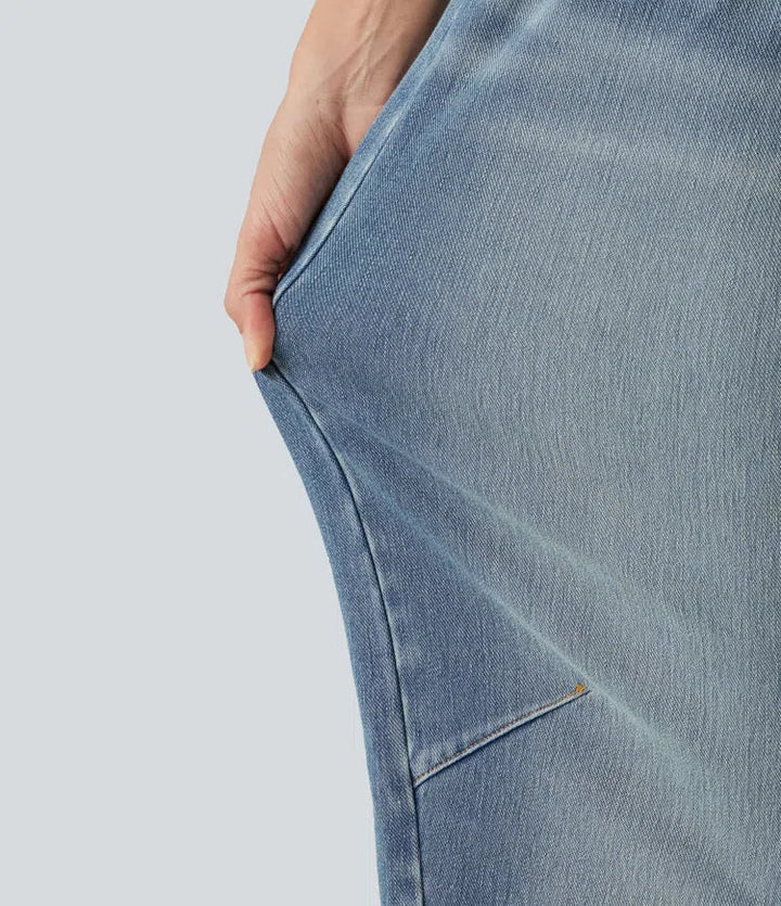 Högmidjade dam jeans i barrel ben modell med sidofickor