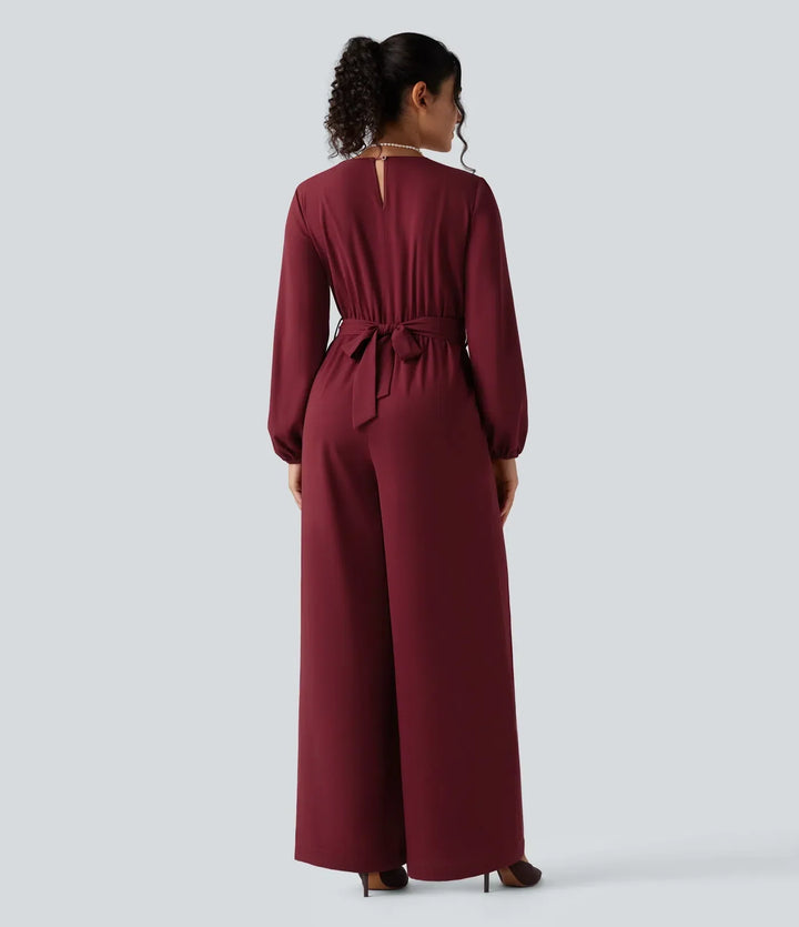 Elegant festjumpsuit för dam med markerad midja och bälte