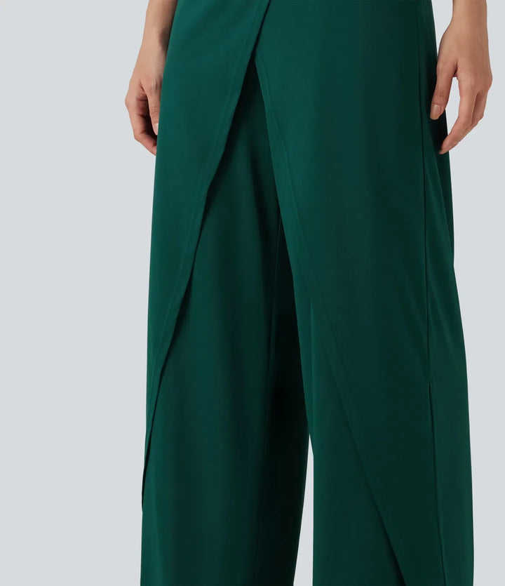 Moderna kläder: grön jumpsuit med skön passform och fickor