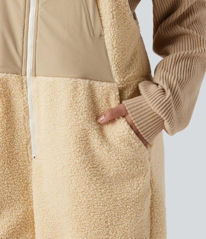 Vardaglig overall för kvinnor i fluffig sherpa med smarta detaljer