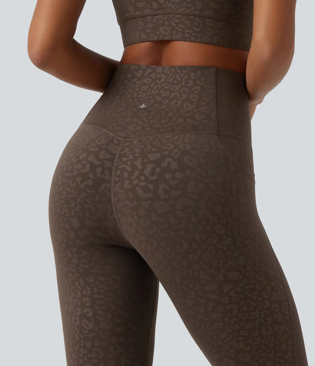 Högmidjade sporttights med funktionell design för dam