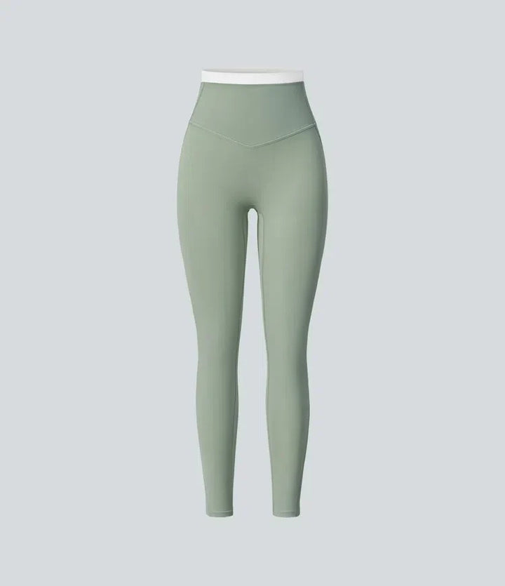 Högmidjade sportleggings med skön passform och fickor