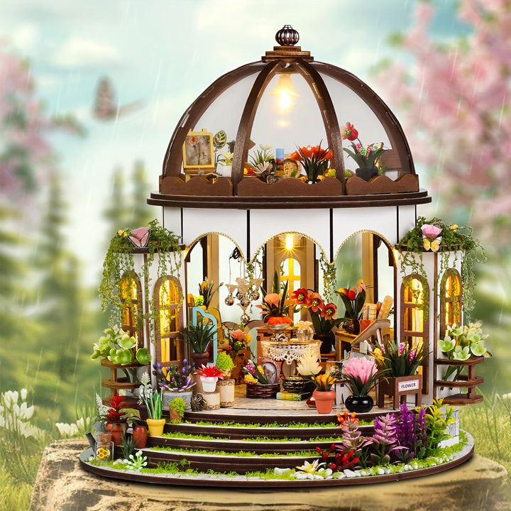 Detaljbild på 3D träpussel blomhus med gröna växtdetaljer och pyssel