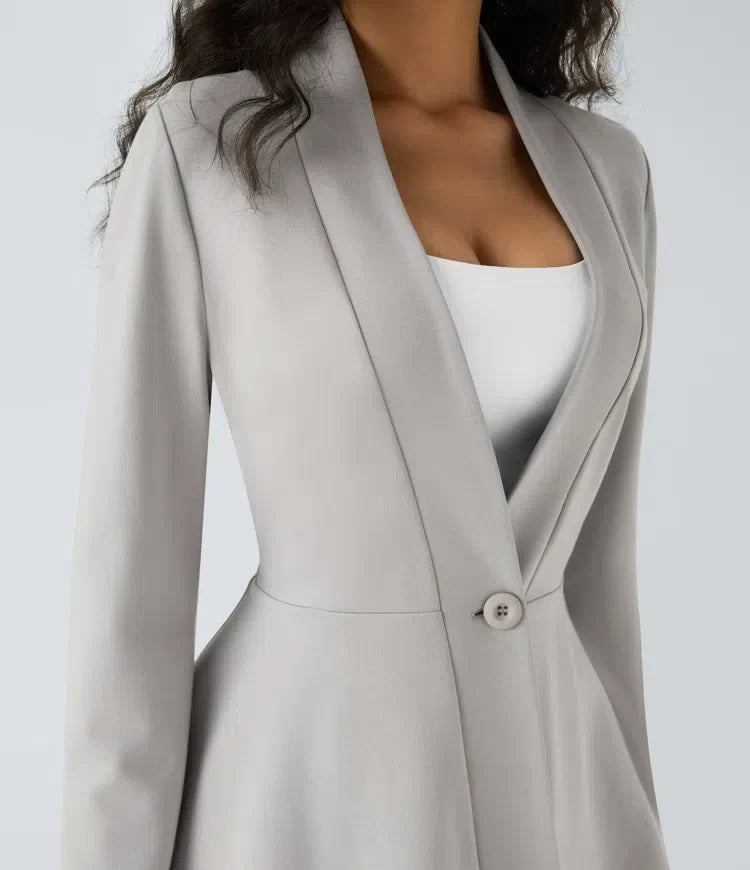 Stilren dam arbetsjacka med v-ringning och peplum-modell i kontorsstil